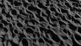 Sand footprints clouds monochrome landart - footprint free wallpaper