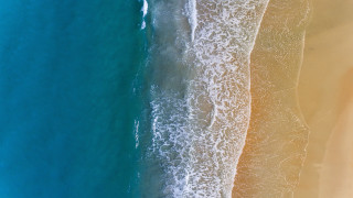 Beach surfboard water shore waves - a sandy shore free wallpaper