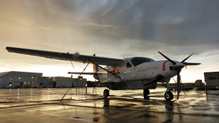 Small airplane tarmac cloudy sky - an airport free wallpaper