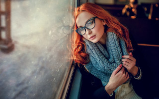 Red hair glasses wall portrait - against a wall free wallpaper