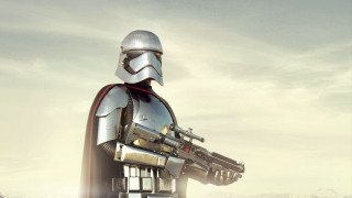 Star wars helmet gun matte - a star wars character holding free wallpaper
