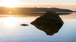 Rock water sunset tree horizon - akseli gallenkallela free wallpaper