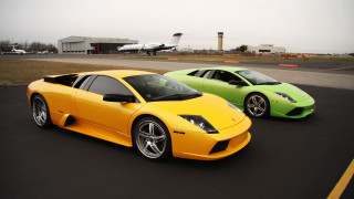 Yellow green sports cars runway - a plane in the background free wallpaper