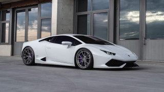 White sports car parked building - pearlescent free wallpaper
