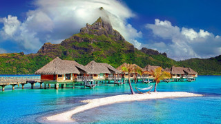 Tropical island dock thatched huts - hut free wallpaper