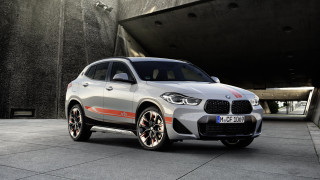 Silver bmw suv building large - christian hilfgott brand free wallpaper
