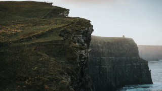 Cliff overlooking ocean lighthouse nature - a lighthouse free wallpaper