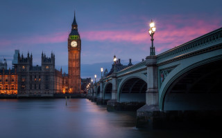 Clock tower cityscape bridge sunset - over a city free wallpaper