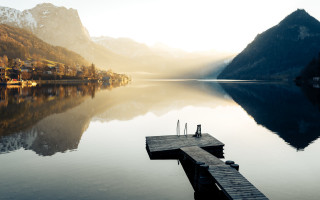 Lake mountain dock person sunset - german romanticism free wallpaper for desktop