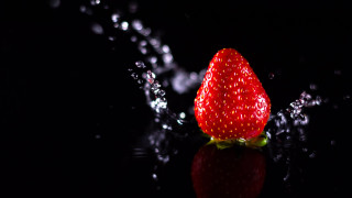 Strawberry black surface water droplets - a strawberry free wallpaper for desktop