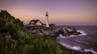 Lighthouse rocky cliff sunset purple - allan brooks free wallpaper