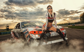 Woman car track cloudy sky - top of a car free wallpaper