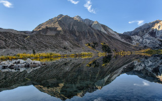 Mountain lake trees sky cliffs - a lake in the foreground free wallpaper