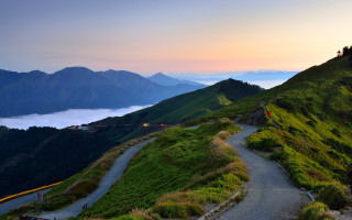 Mountain road clouds hill person - road free wallpaper for desktop