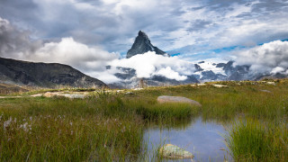 Mountain lake clouds rocks nature - a lake in the foreground free wallpaper