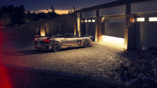 Sports car night garage open - its light free wallpaper