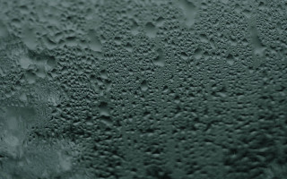 Water drops window black white - a close up of a window free wallpaper