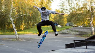 Man flying skateboard park trees - a trick free wallpaper