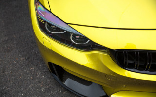 Yellow car front grill headlight - detailed face free wallpaper