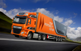 Orange truck mountain road clouds - cgstudio free wallpaper for desktop