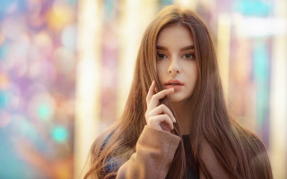 Elina karimova serious portrait bokeh - her finger free wallpaper