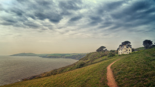 House hill overlooking water mountain - a hill free wallpaper