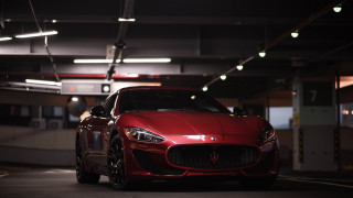 Red maserati parking garage night - a parking garage free wallpaper for desktop