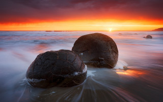 Rocky beach sunset cloudy sky 3 - two large rock free wallpaper
