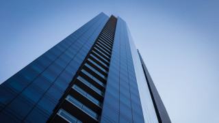 Tall building blue sky clouds 4 - free architecture wallpaper