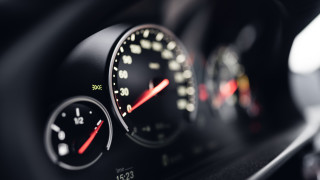 Speedometer gauges dashboard tiltshift motionblur - a car dashboard free wallpaper