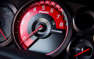 Speedometer closeup car dashboard gauges - a car dashboard free wallpaper