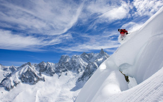 Skier jumping snowy mountain air - eric deschamps free wallpaper