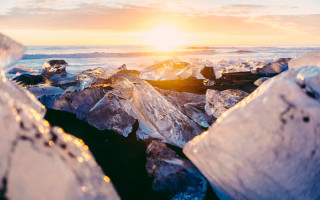 Ice chunks beach sunset ocean - top of a beach next free wallpaper
