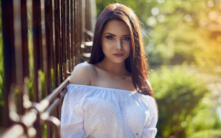 Romantic woman portrait fence longhair - a white top free wallpaper
