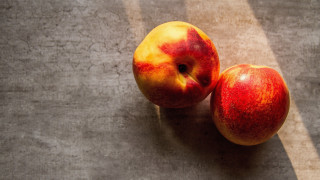 Two apples table shadows food - the ground behind them free wallpaper