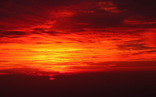 Red sky plane sunset ocean - the distance behind free wallpaper