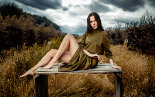 Woman bench field cloudy sky - a cloudy sky in the background free wallpaper