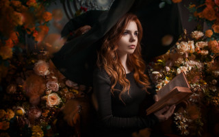 Woman black dress holding book - a flowery background free wallpaper