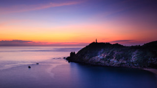 Sunset lighthouse boat water sky - a lighthouse free wallpaper