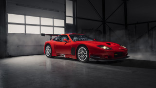 Red sports car garage smokestack - a door open free wallpaper