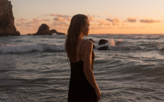 Woman beach sunset ocean waves - evan charlton free wallpaper