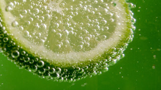 Lime slice water bubbles green - a lime free wallpaper