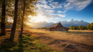 Barn field mountains blue sky - a barn in a field free wallpaper