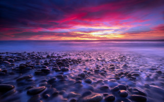 Mystical beach sunset reflection ocean - sky above free wallpaper