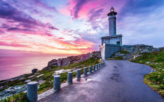 Lighthouse rocky cliff sunset ocean 3 - arthur b. carles free wallpaper