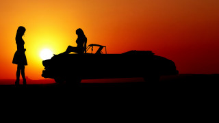 Romantic sunset couple car silhouette - the back of the car free wallpaper