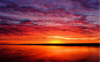 Sunset red purple clouds water - colorful cloud free wallpaper