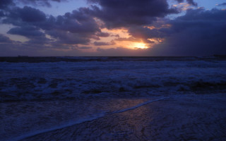 Sunset ocean waves cloudy sky - a sun setting free wallpaper