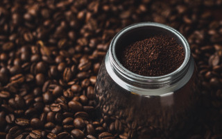 Coffee jar on beans bokeh - small free wallpaper
