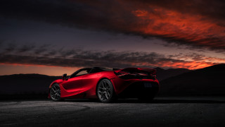 Red sports car sunset dark - a dark sky in the background free wallpaper for desktop